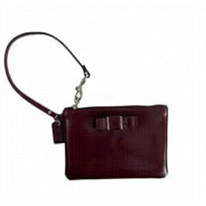 Coach bow wristlet bag